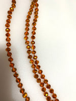 28 inch orange bead necklace